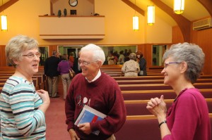 Bishop Johnson speaking with Conference members 