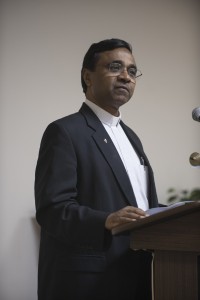 Dr. Christopher Kurien leads the prayer time during the Lawmakers' Prayer Breakfast at Grace UMC in Harrisburg, PA