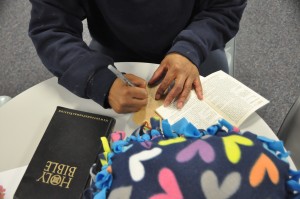 Inmate writing chosen scripture
