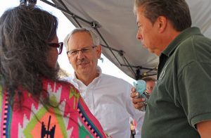 Bishop Bruce R. Ough and Rev. David Wilson speaking with Phyllis Young, member and former council woman of the Standing Rock nation at Oceti Sakowin Camp, near Cannon Ball, ND. 