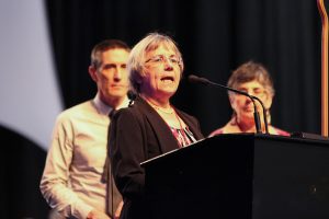 Verna Collver addresses the 2016 Annual Conference during its Act of Repentance, along with the Rev. Gary Jacabella and Sherry Wack, fellow CONAM members. Sabrina Daluisio photo